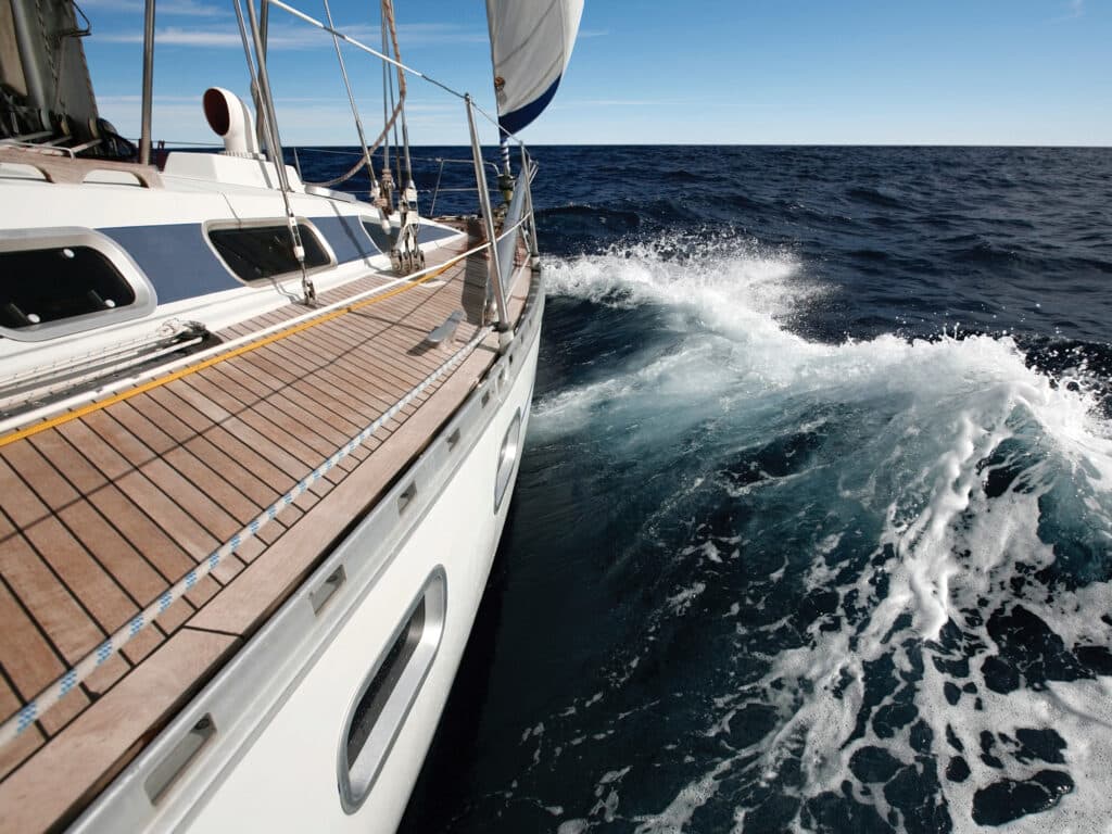 Sailboat in blue water