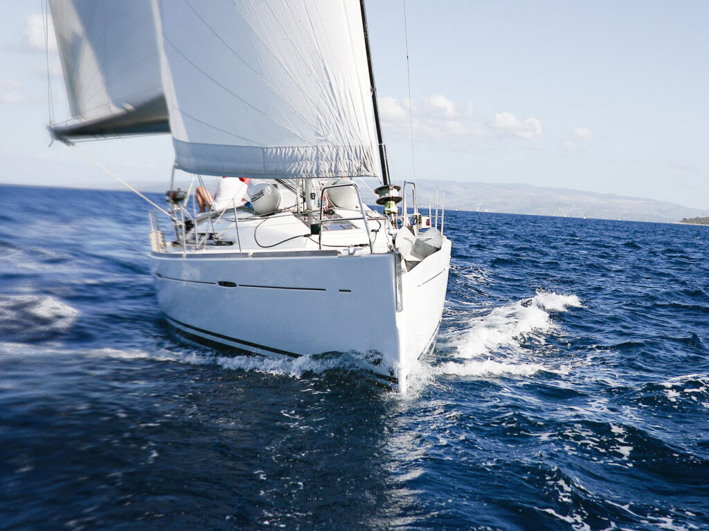 Luxury yachts at Sailing regatta. Sailing in the wind through the waves at the Sea.