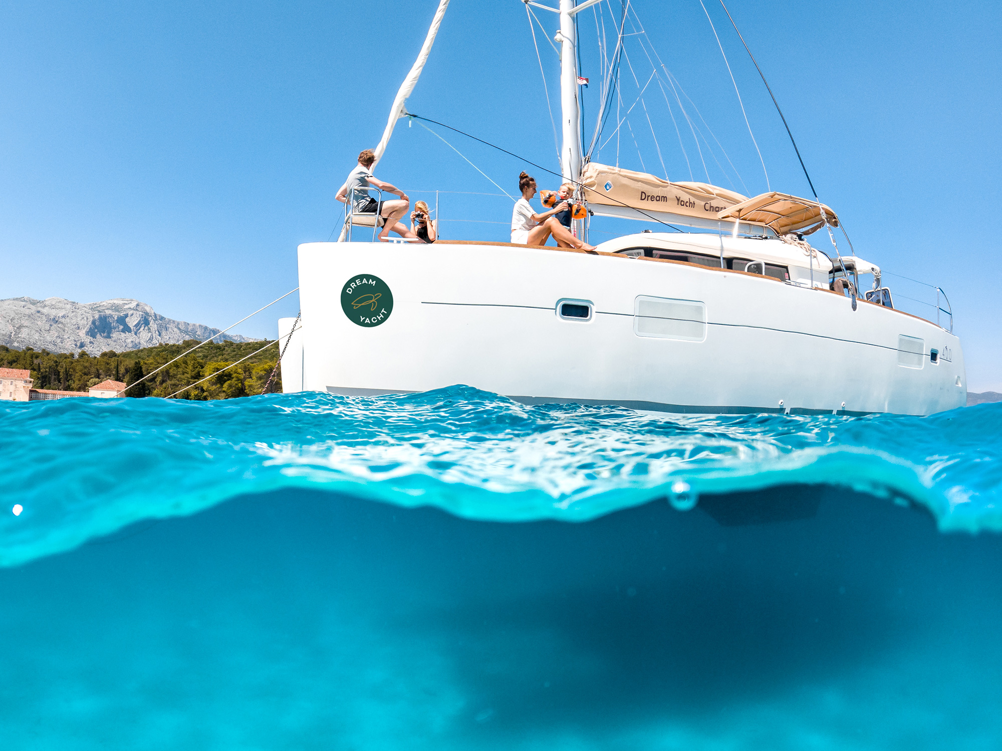 Sailboat on clear blue water